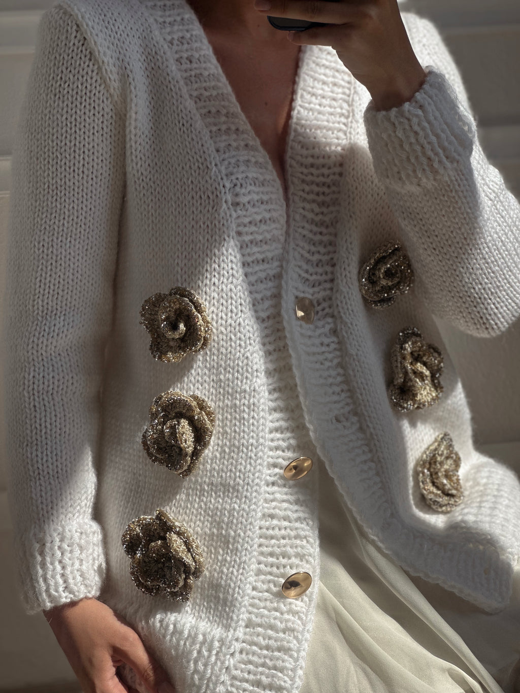 White cardigan with golden roses