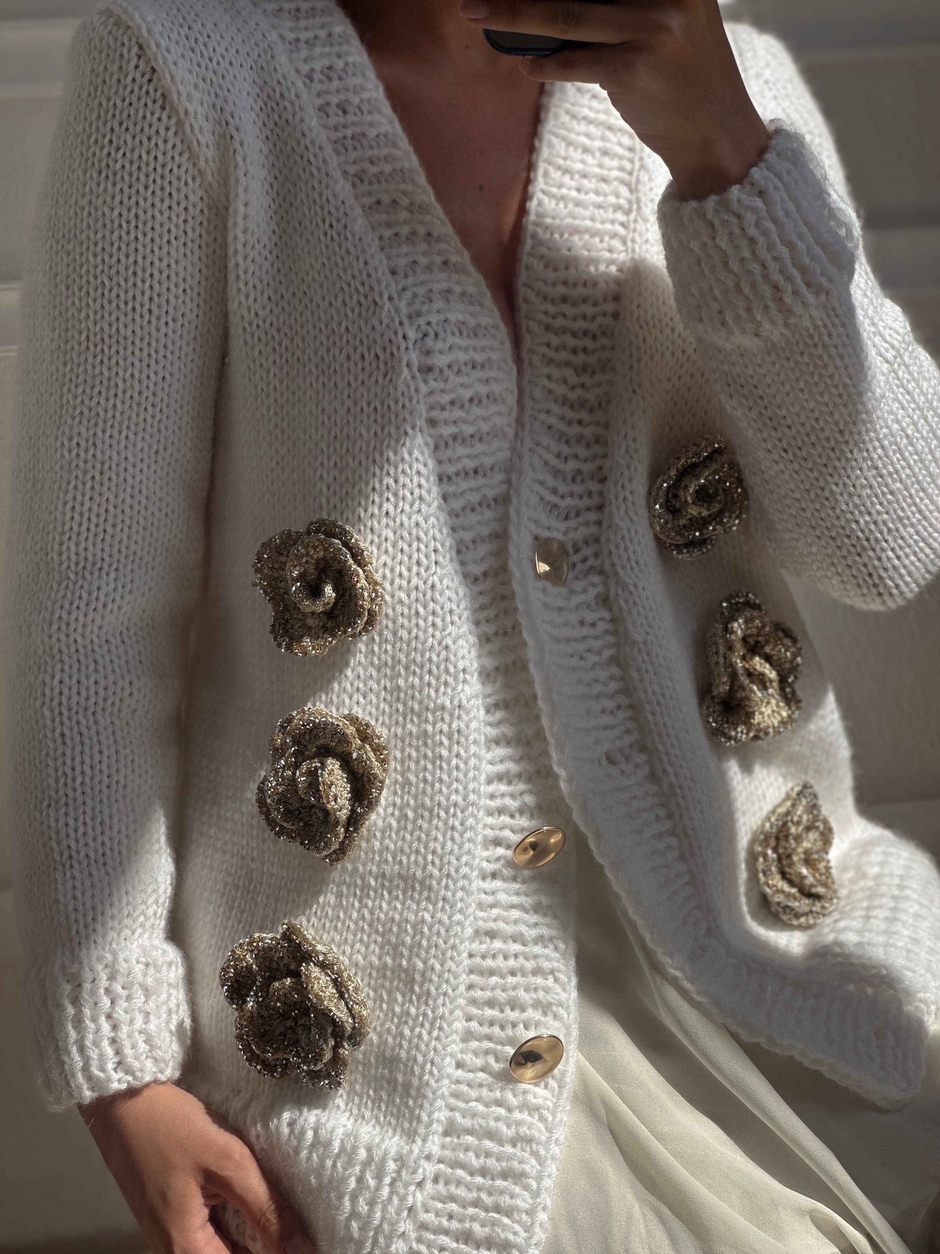 White cardigan with golden roses