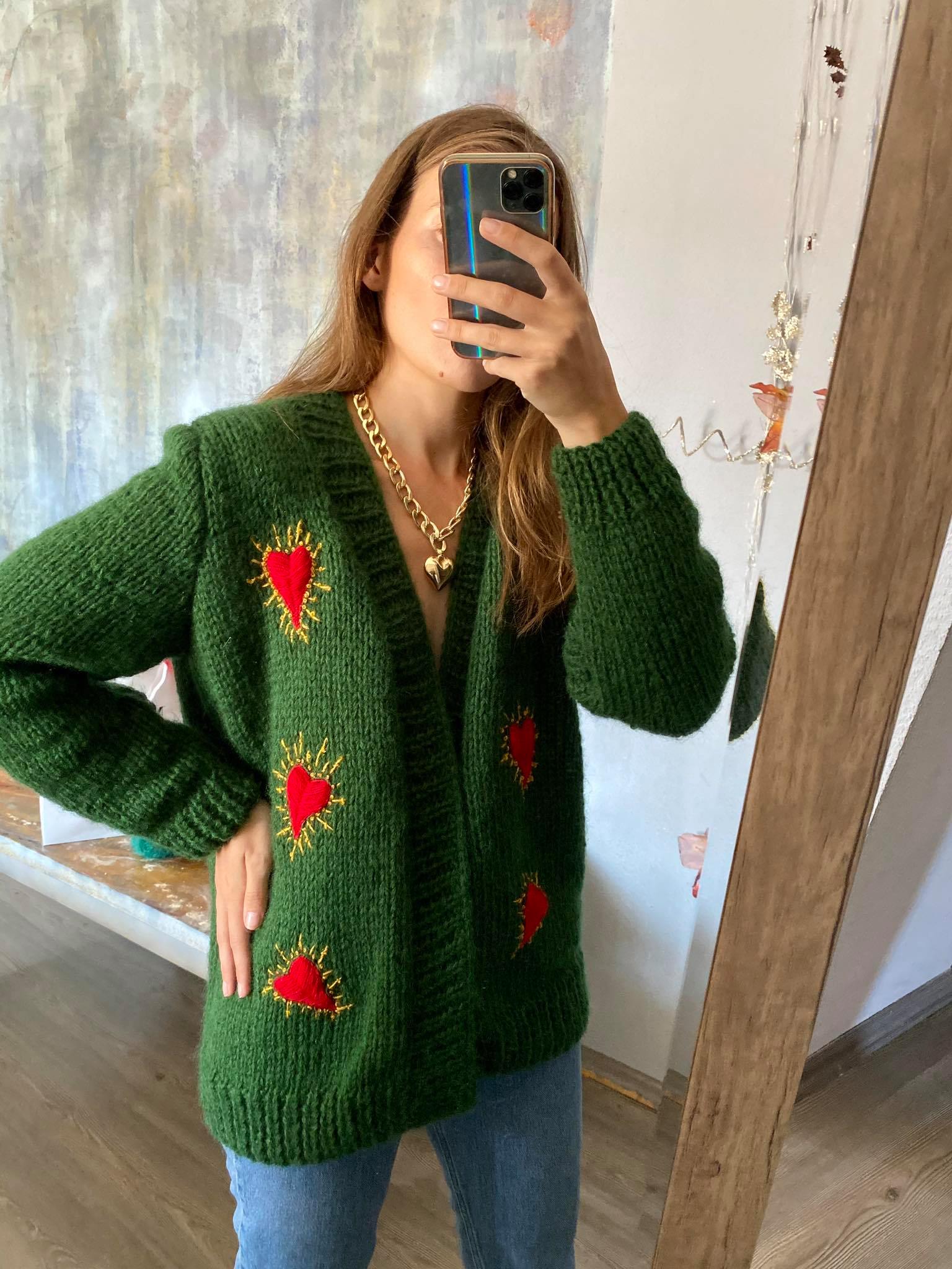 Green wool cardigan with hearts