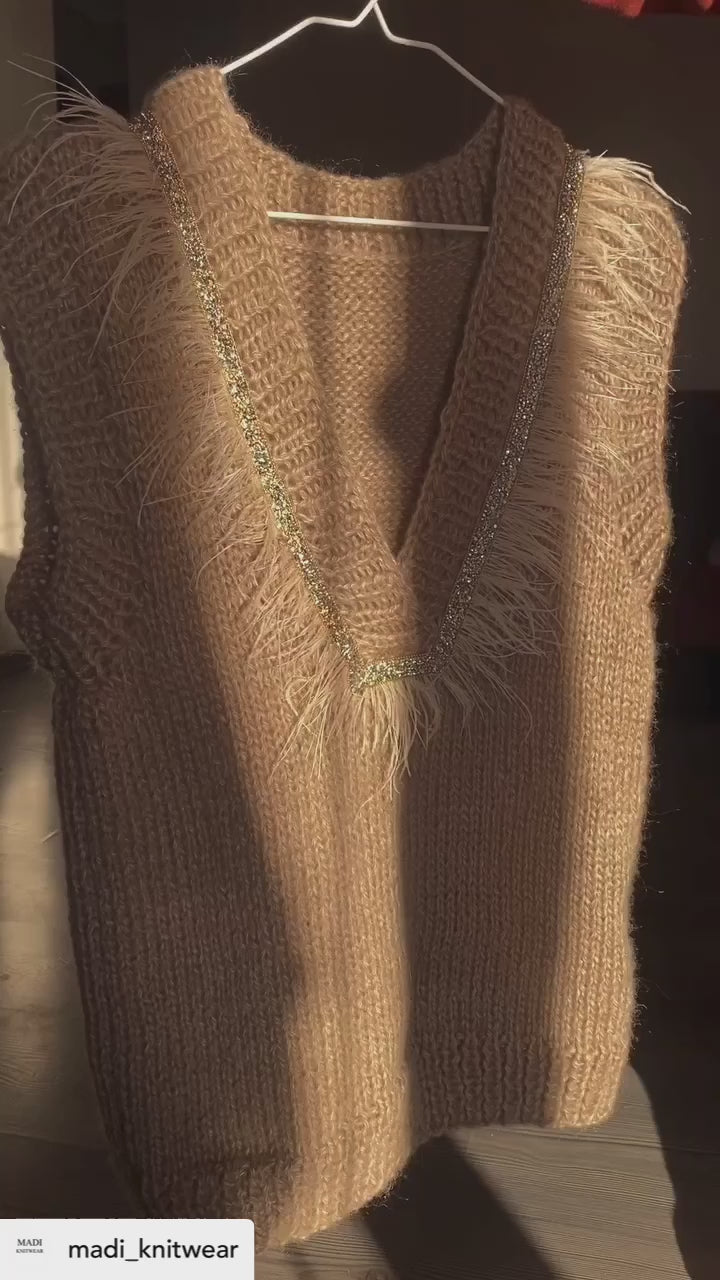 Brown vest with feathers