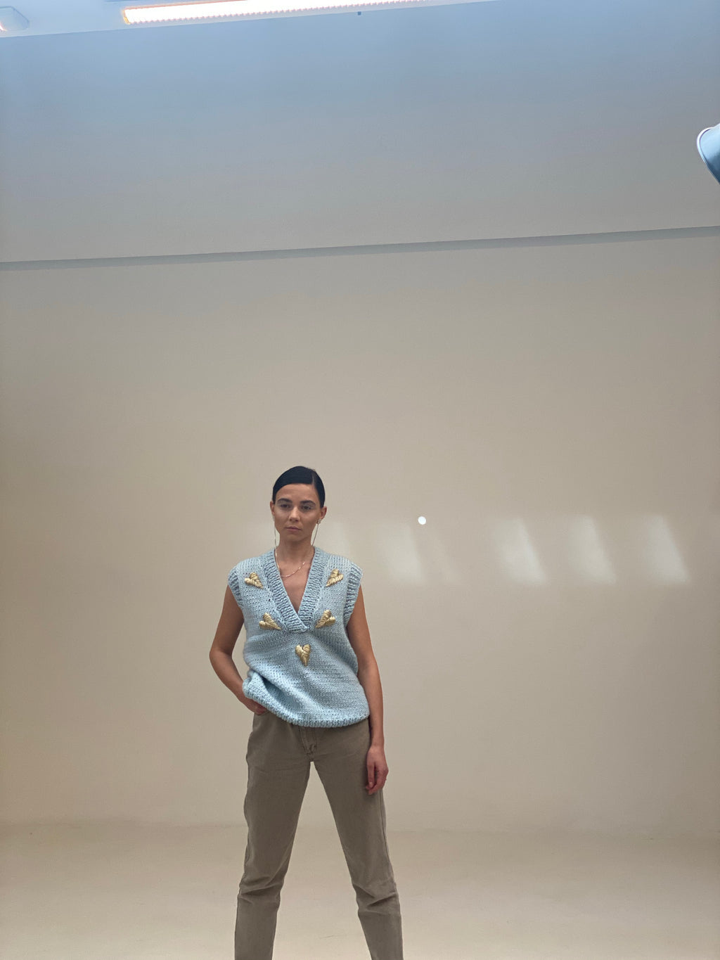 Light blue vest with hearts