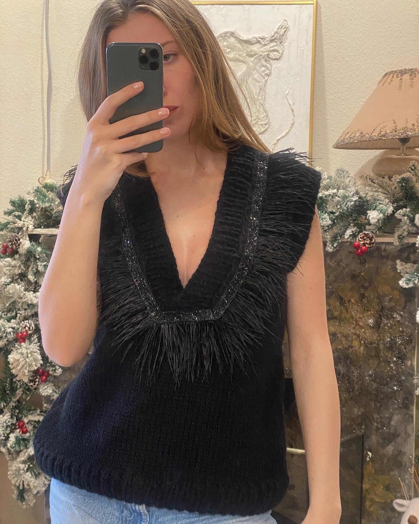 Brown vest with feathers