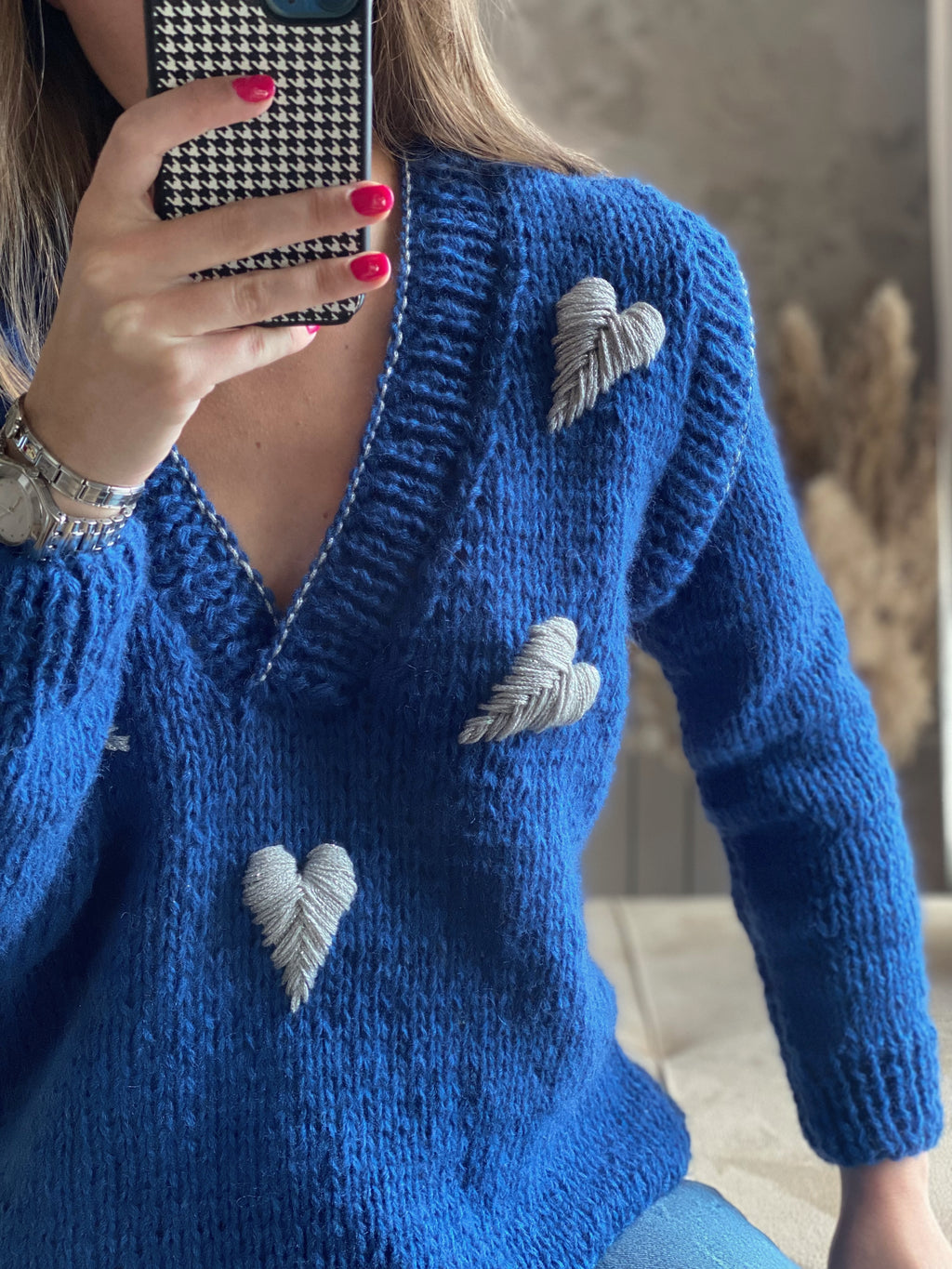 Blue wool sweater with hearts