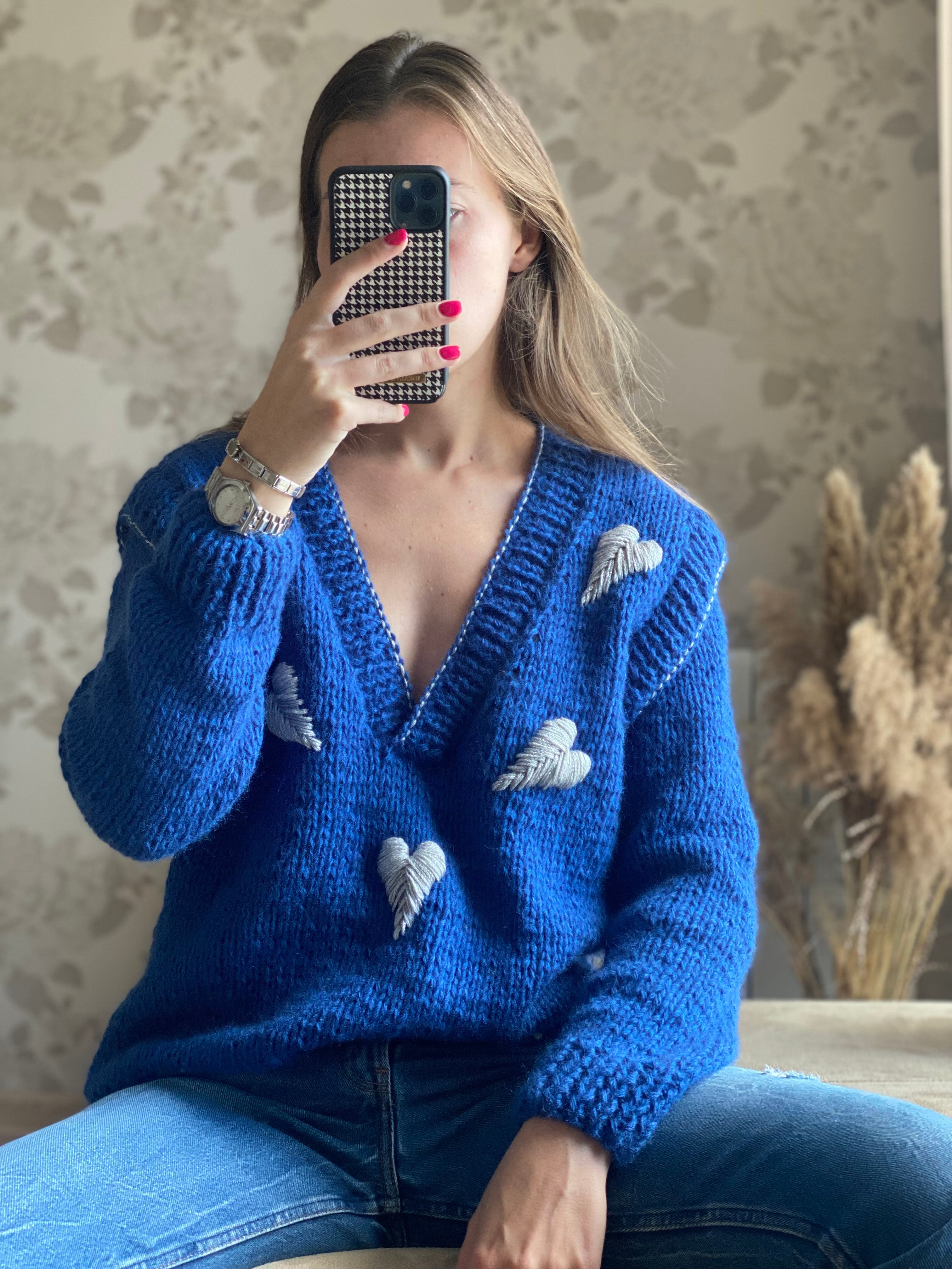 Blue wool sweater with hearts