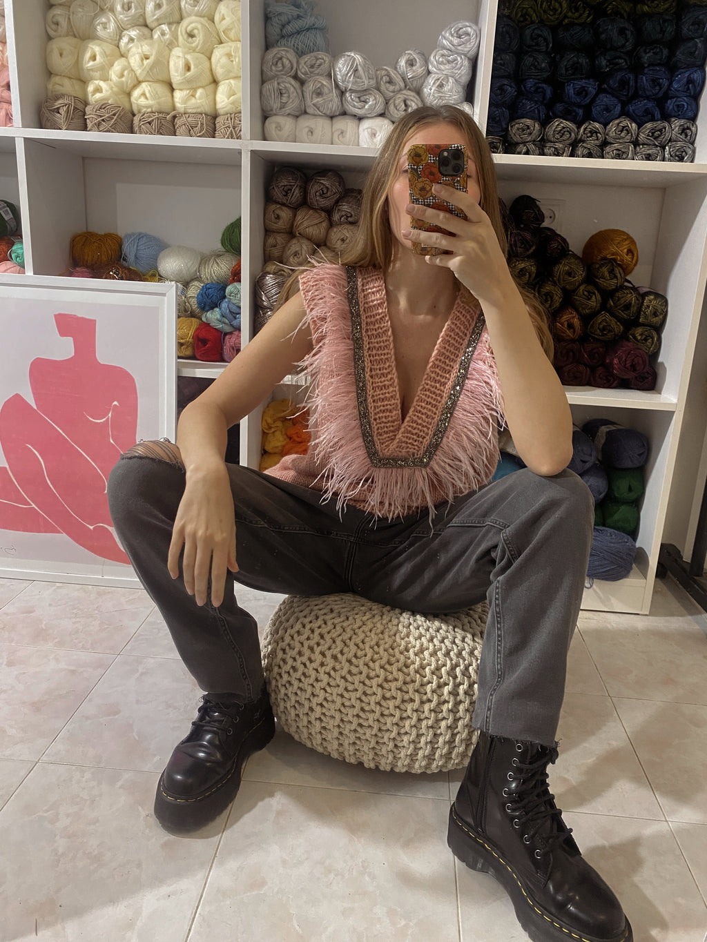 Pink vest with feathers