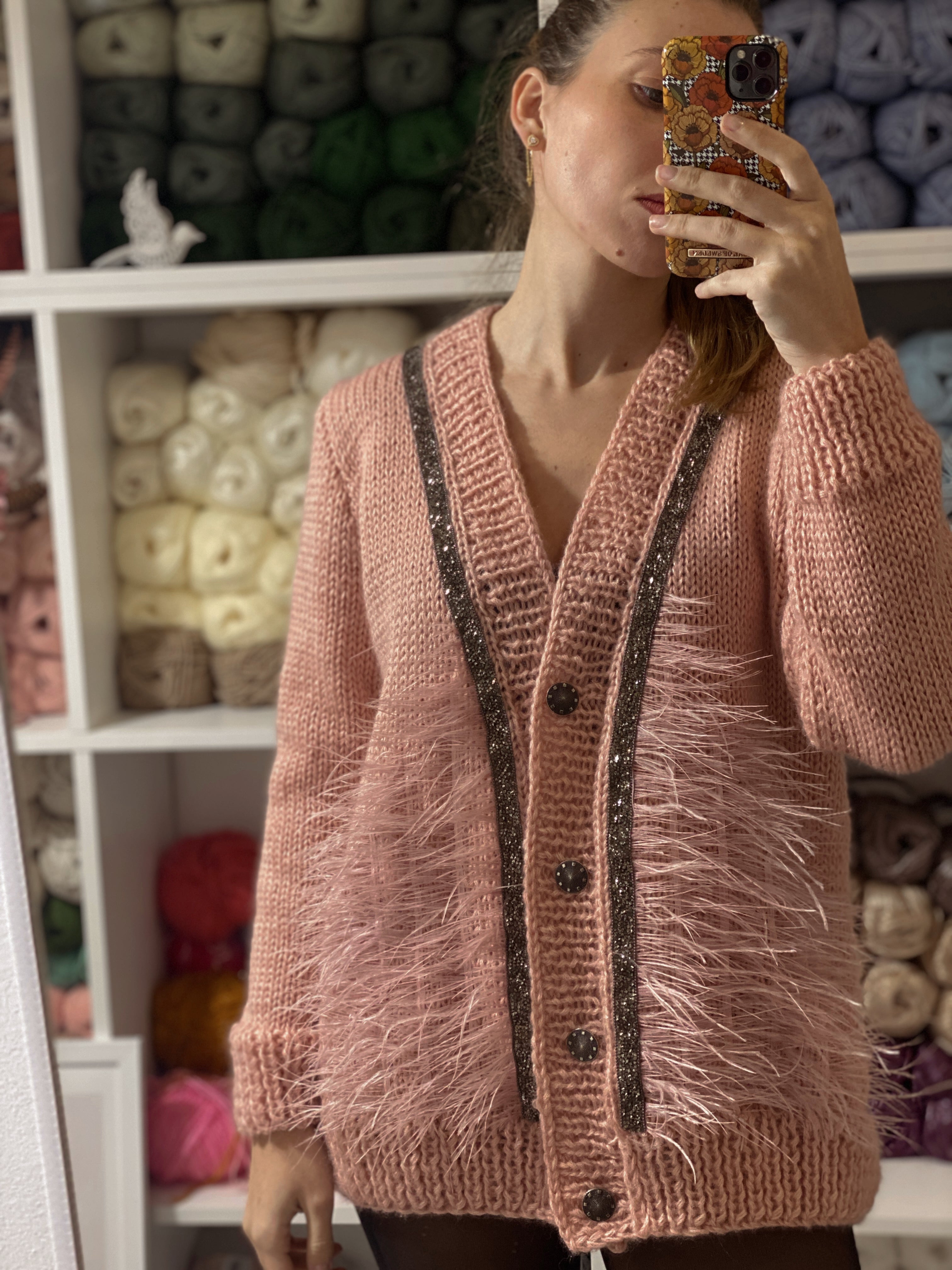Pink wool cardigan with feathers