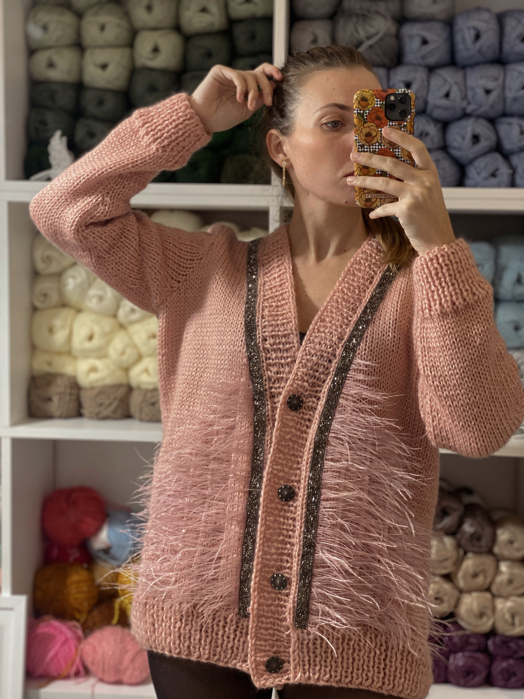 Pink wool cardigan with feathers