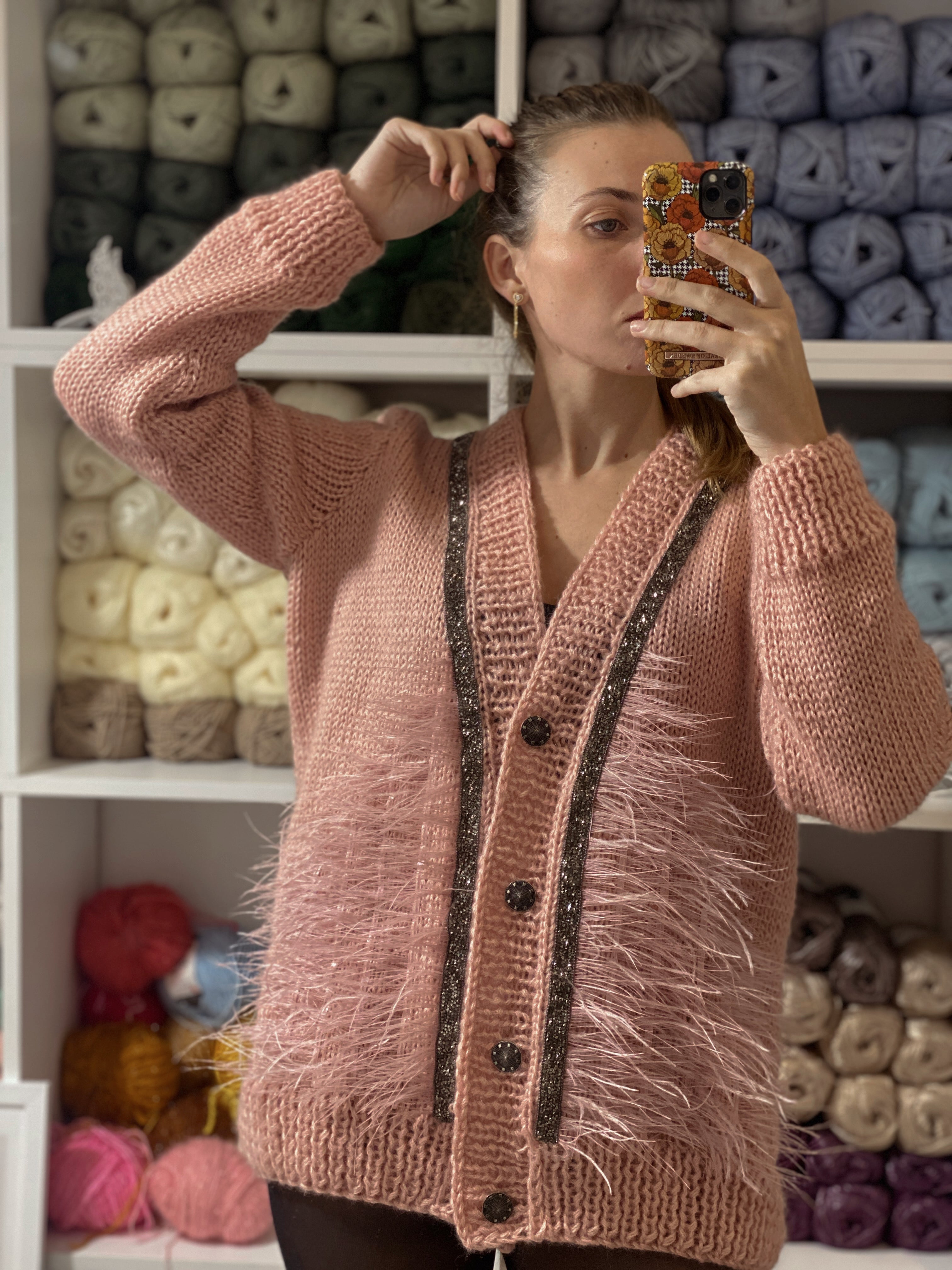 Pink wool cardigan with feathers