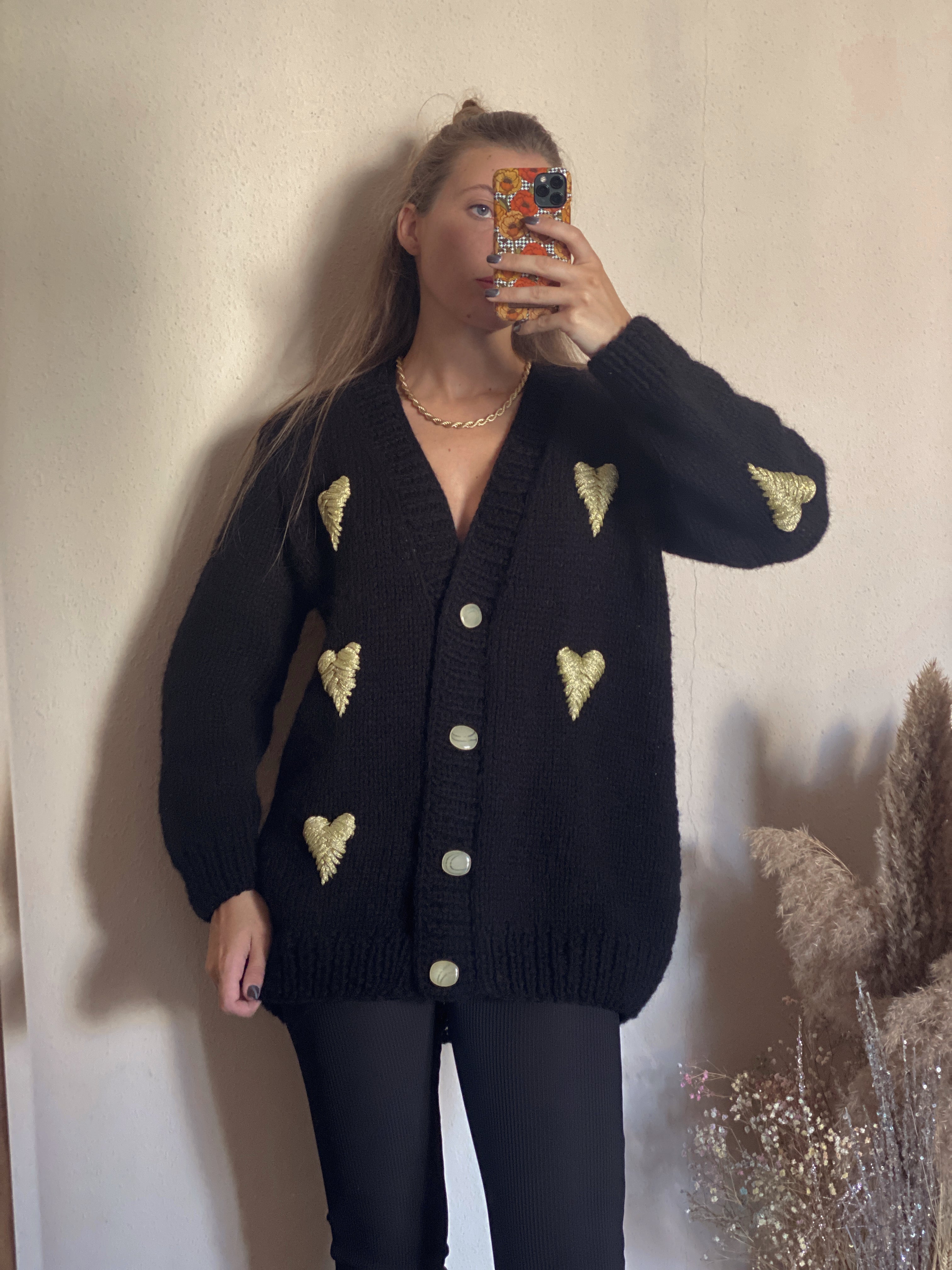 Black cardigan with golden hearts