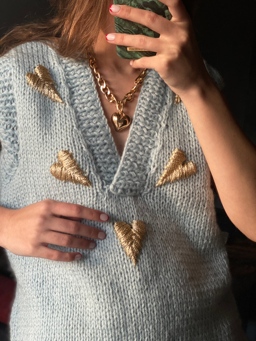 Light blue vest with hearts