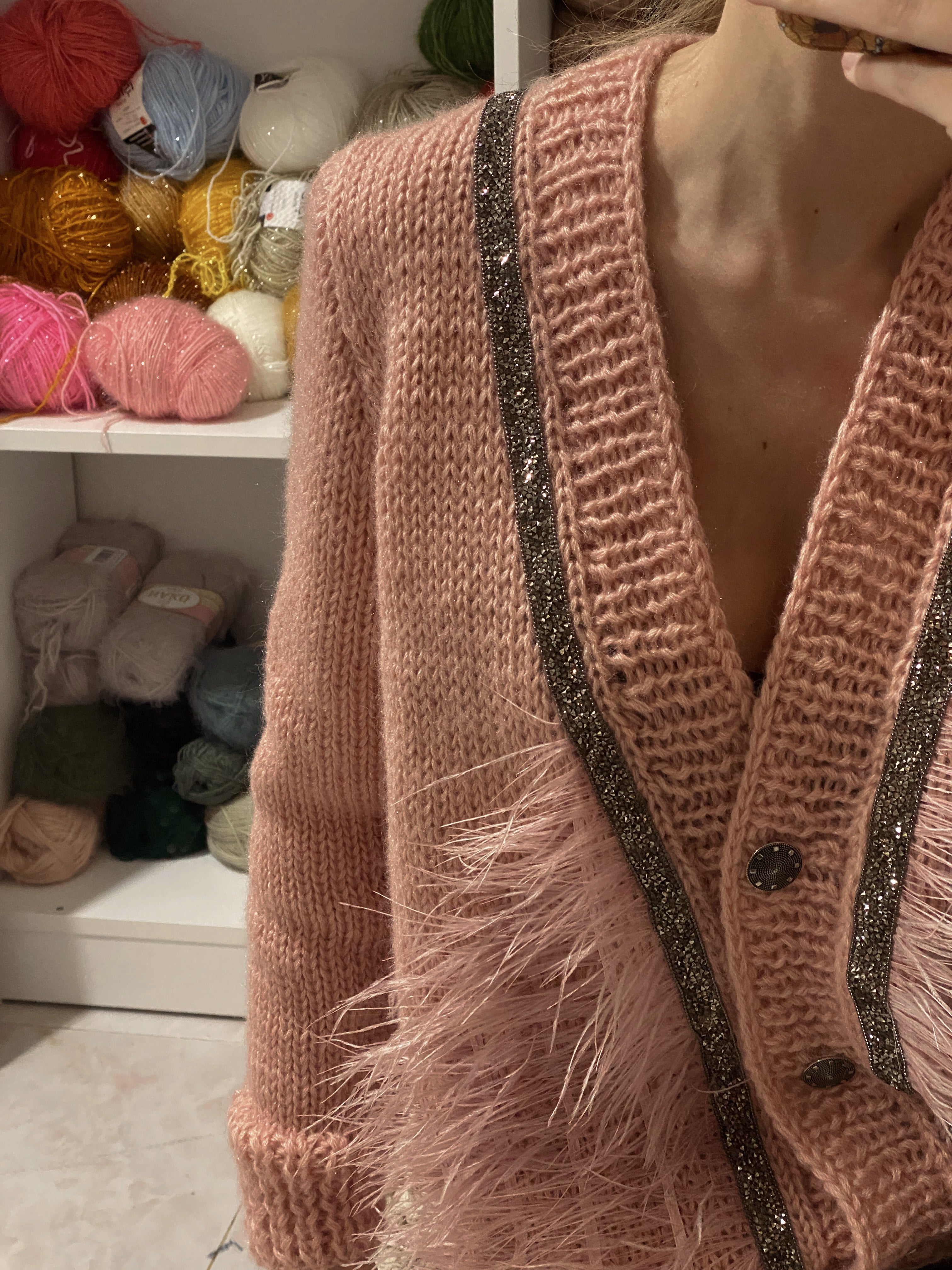 Pink wool cardigan with feathers