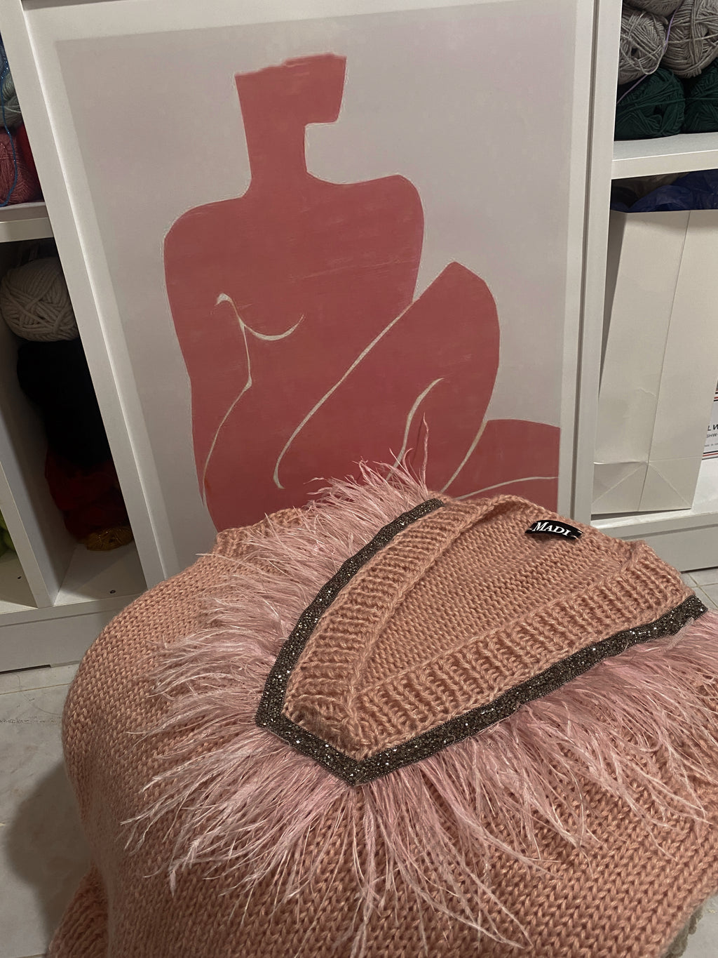 Pink vest with feathers