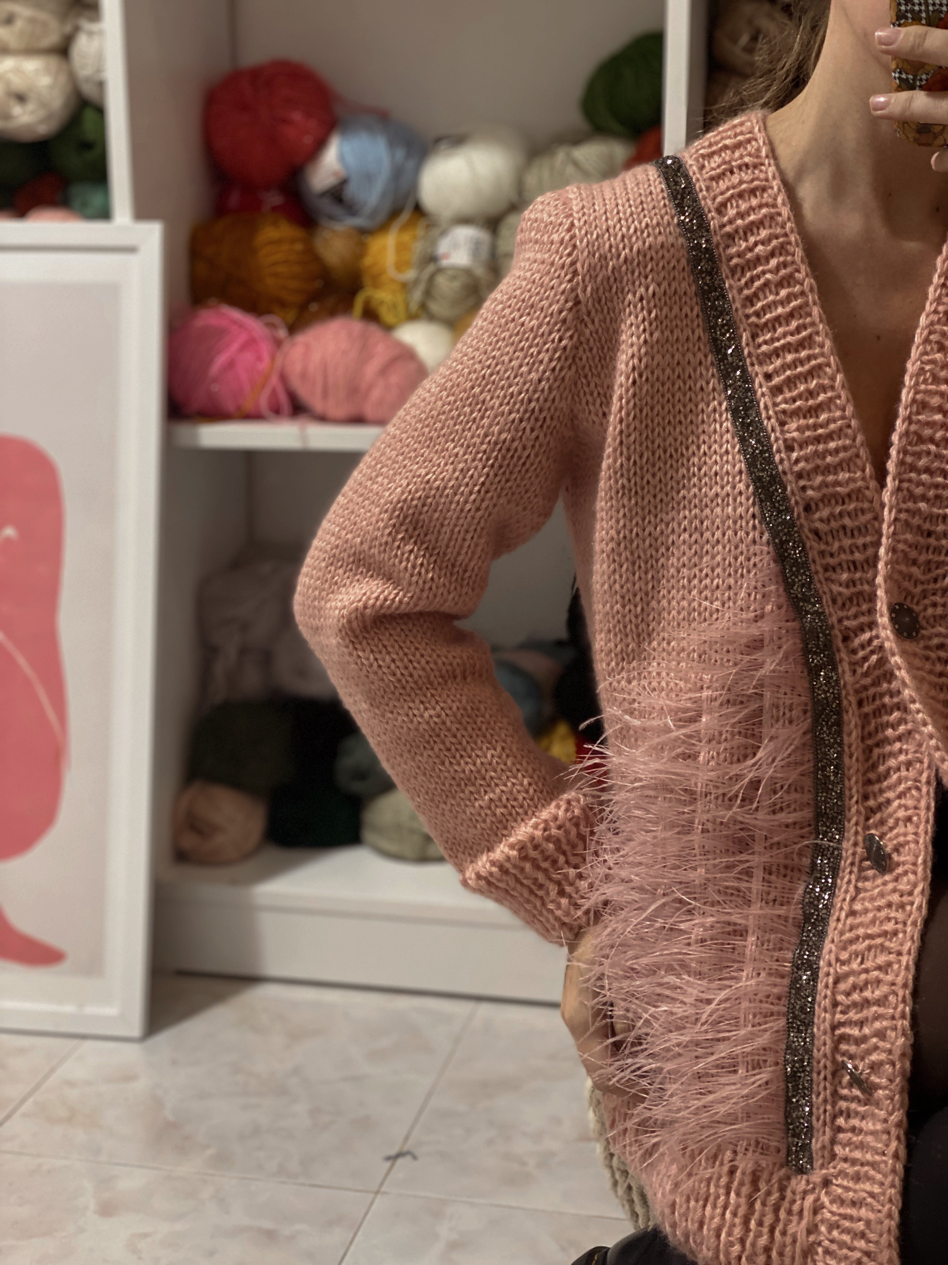 Pink wool cardigan with feathers