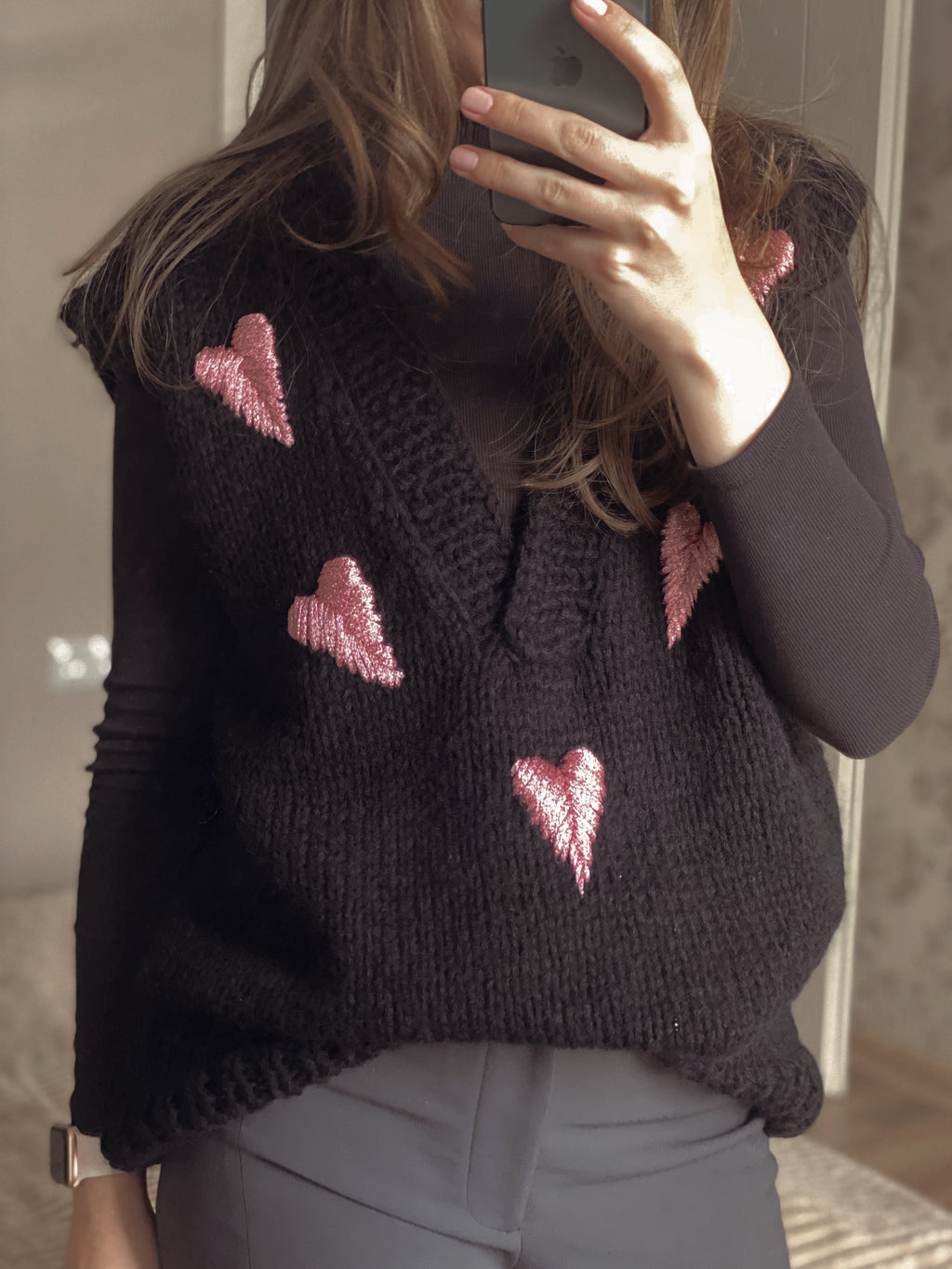 Black wool vest with pink hearts