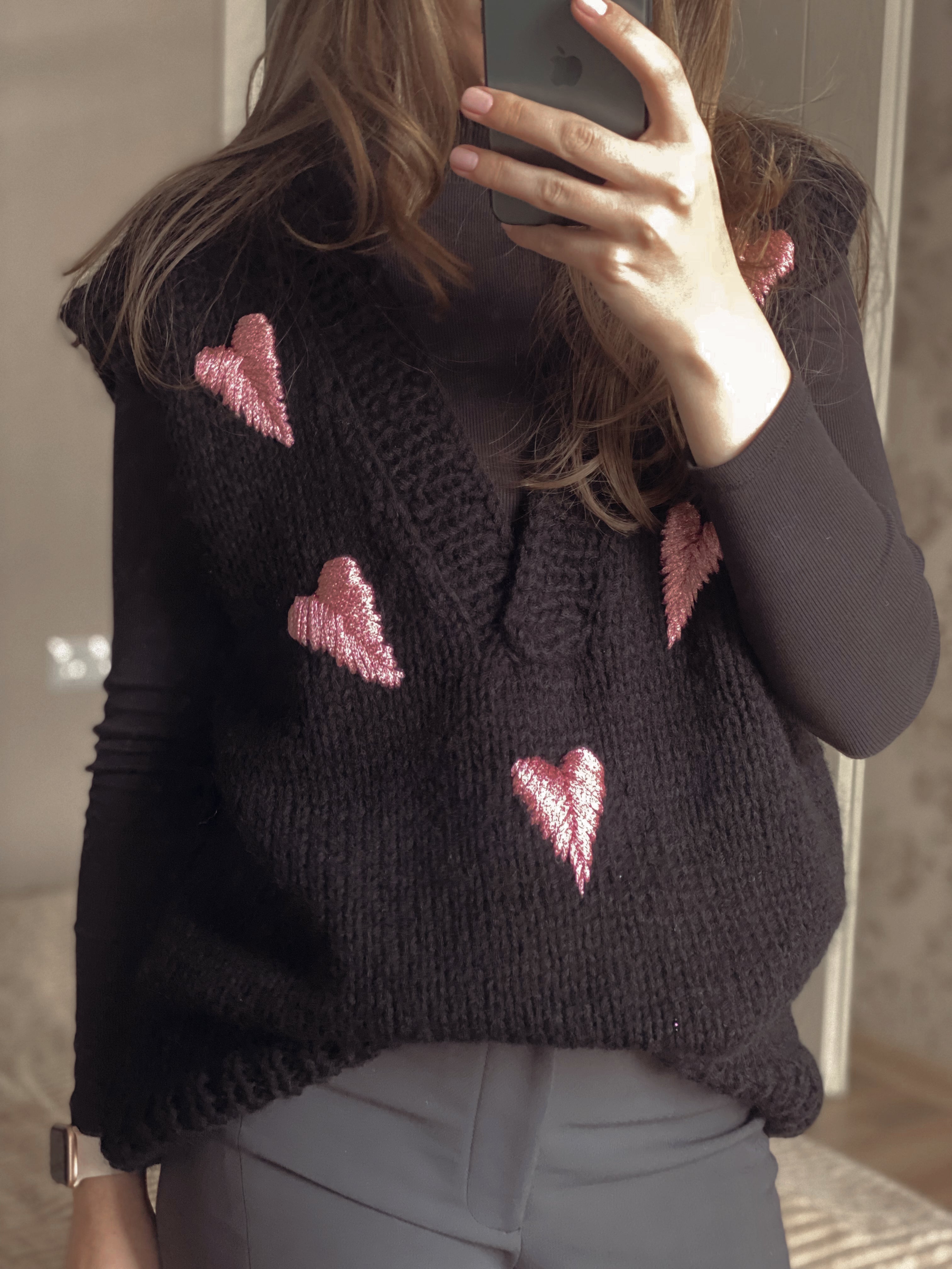 Black wool vest with pink hearts
