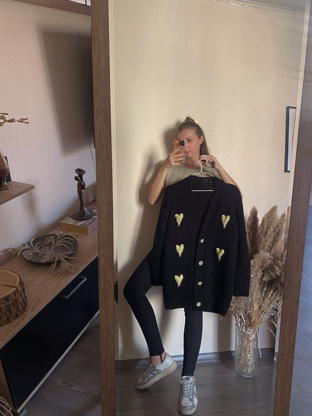 Black cardigan with golden hearts
