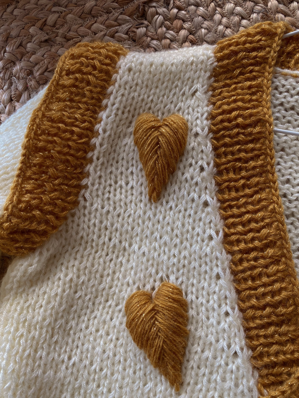 Milky wool sweater with embroidery