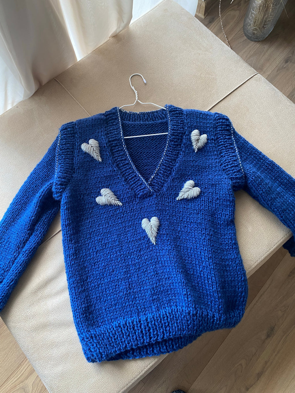 Blue wool sweater with hearts