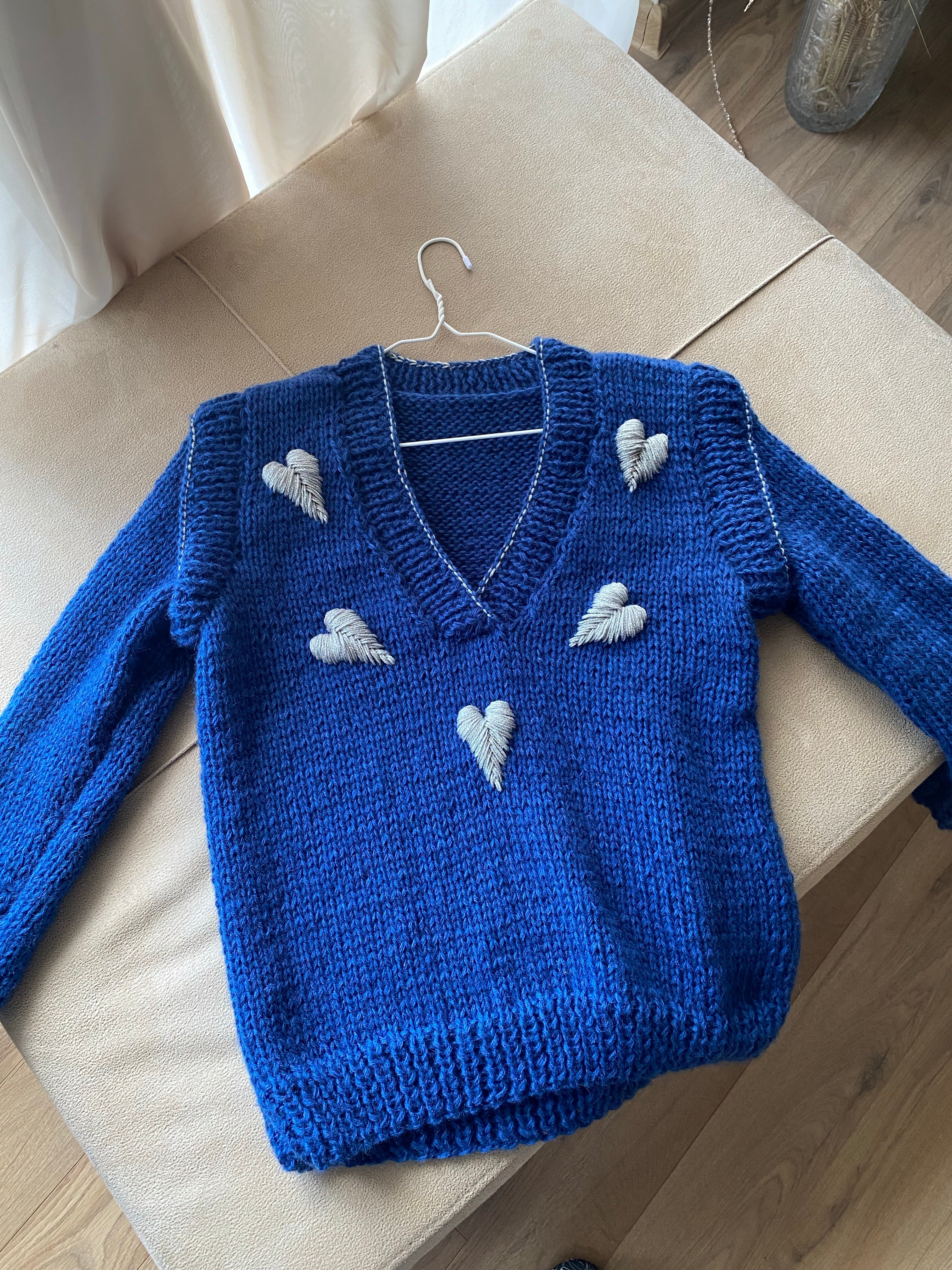Blue wool sweater with hearts