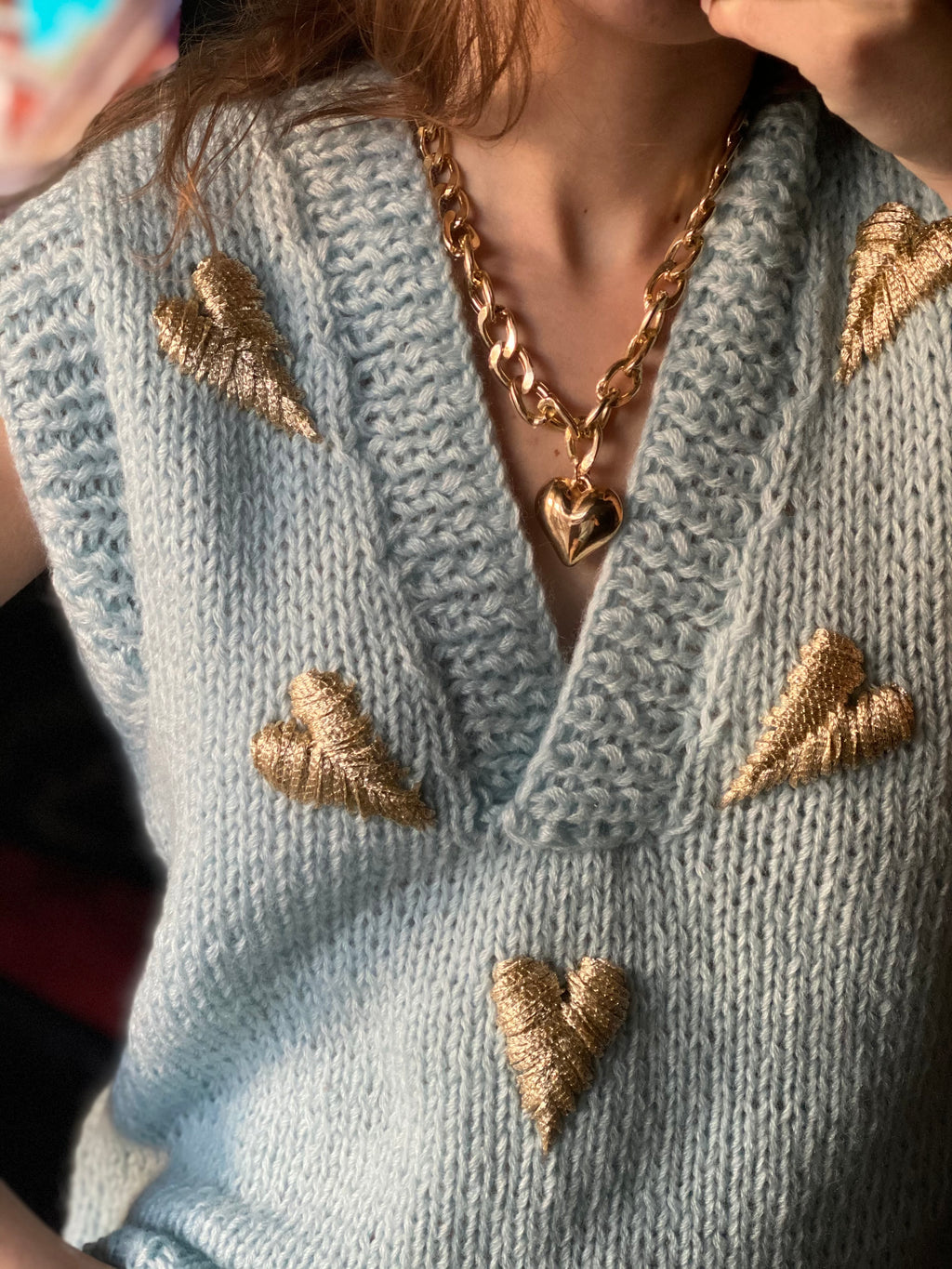 Light blue vest with hearts