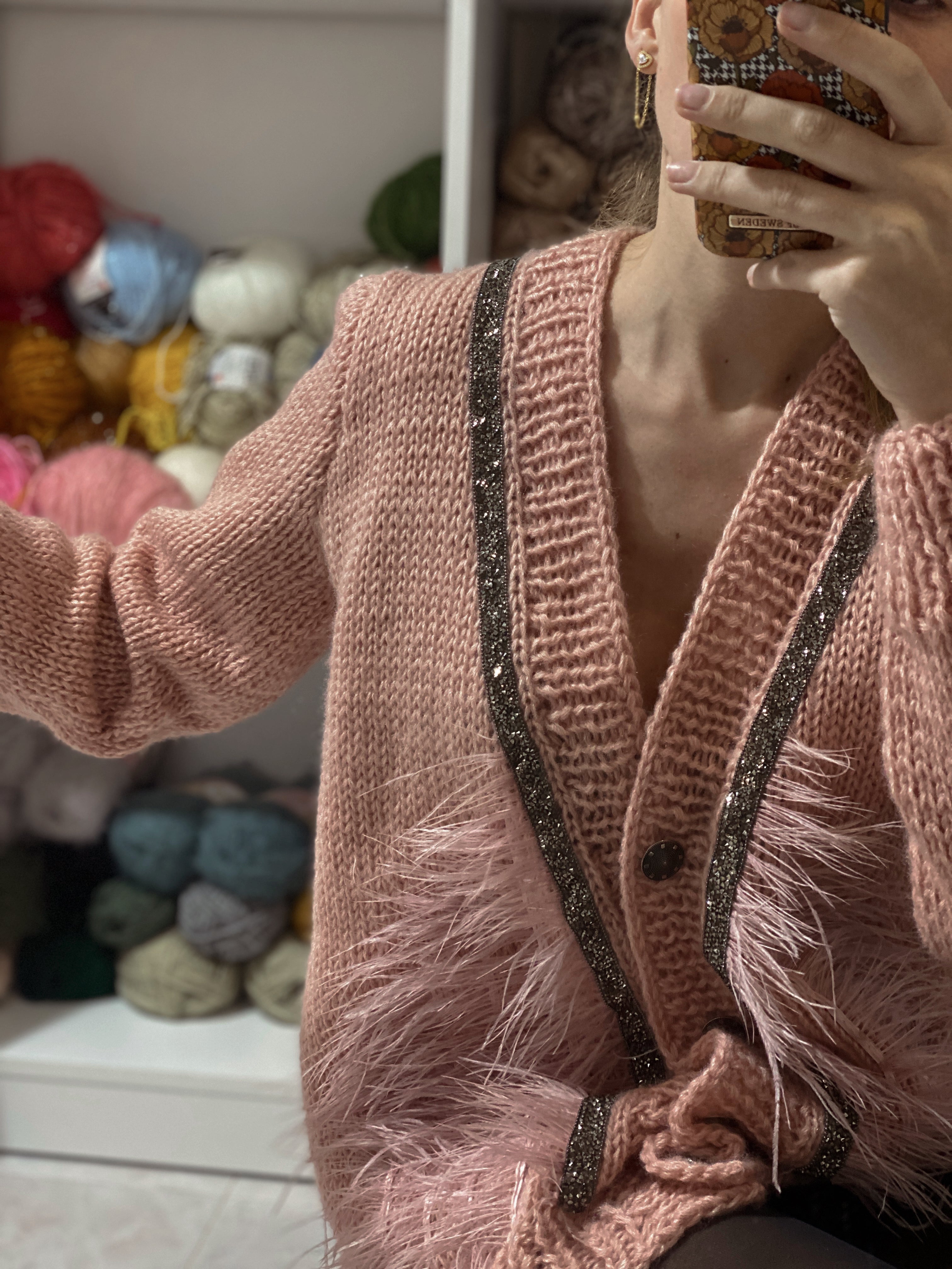 Pink wool cardigan with feathers