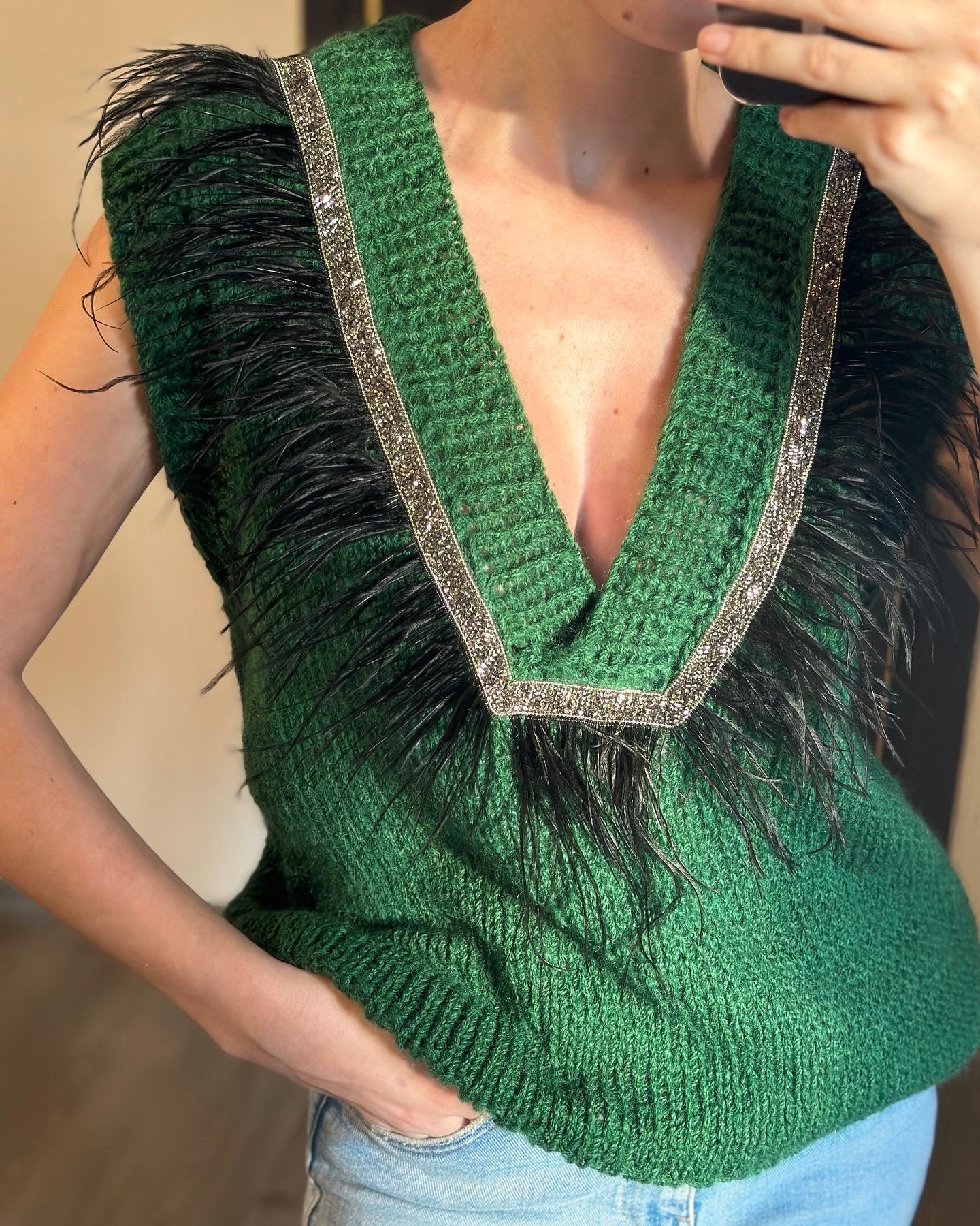 Brown vest with feathers