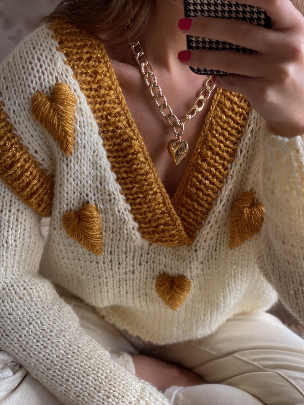 Milky wool sweater with embroidery
