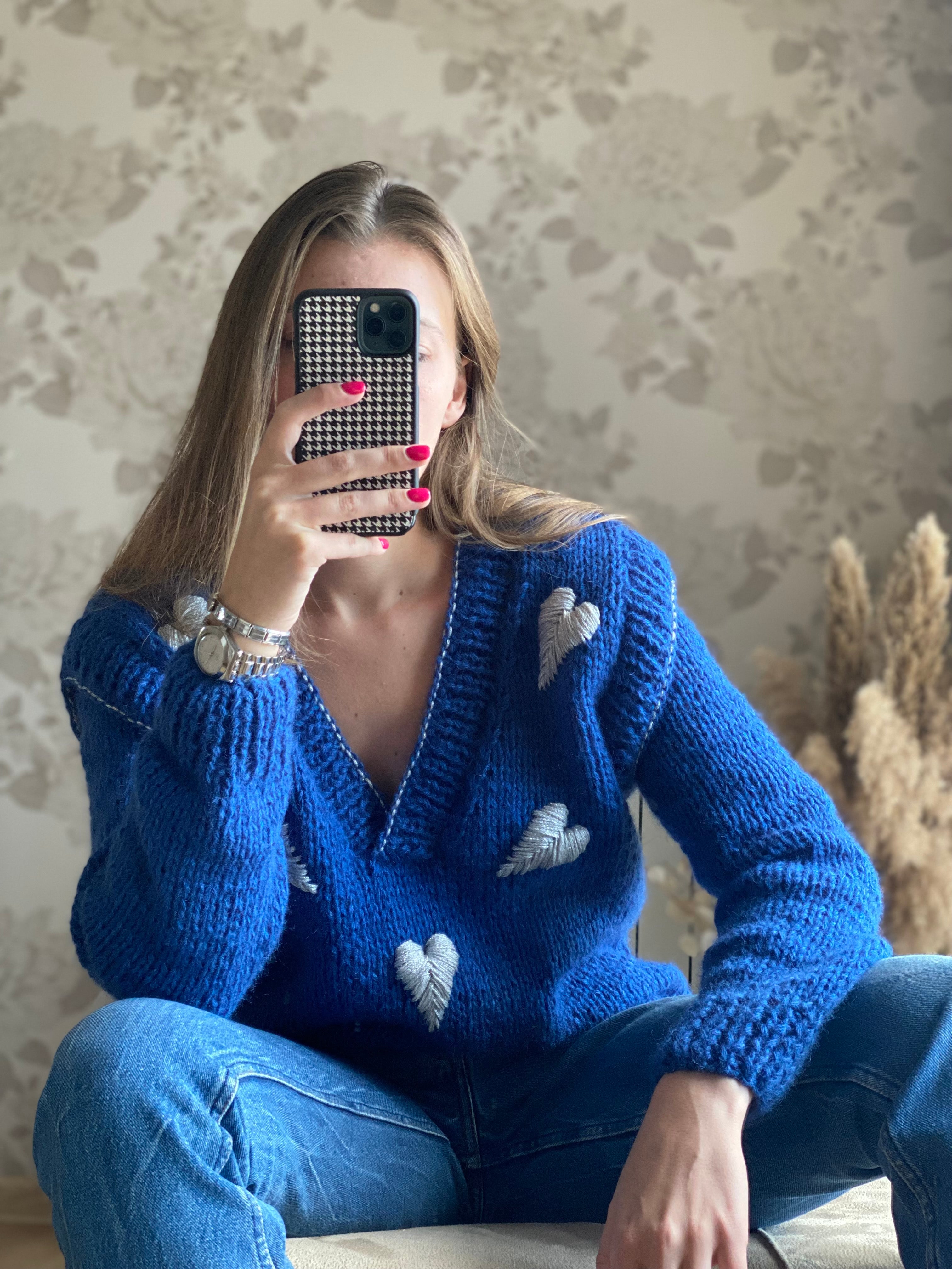 Blue wool sweater with hearts