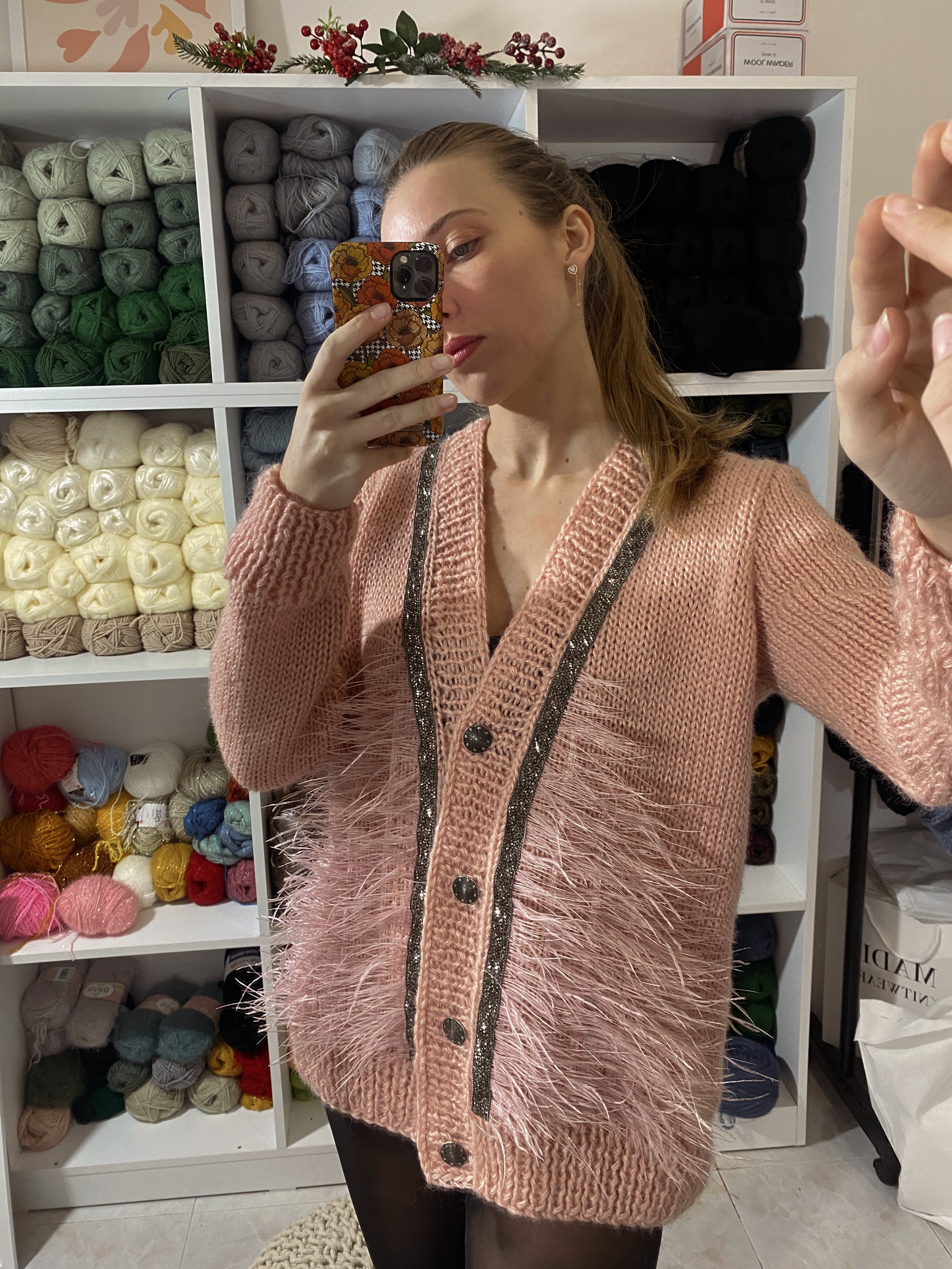 Pink wool cardigan with feathers