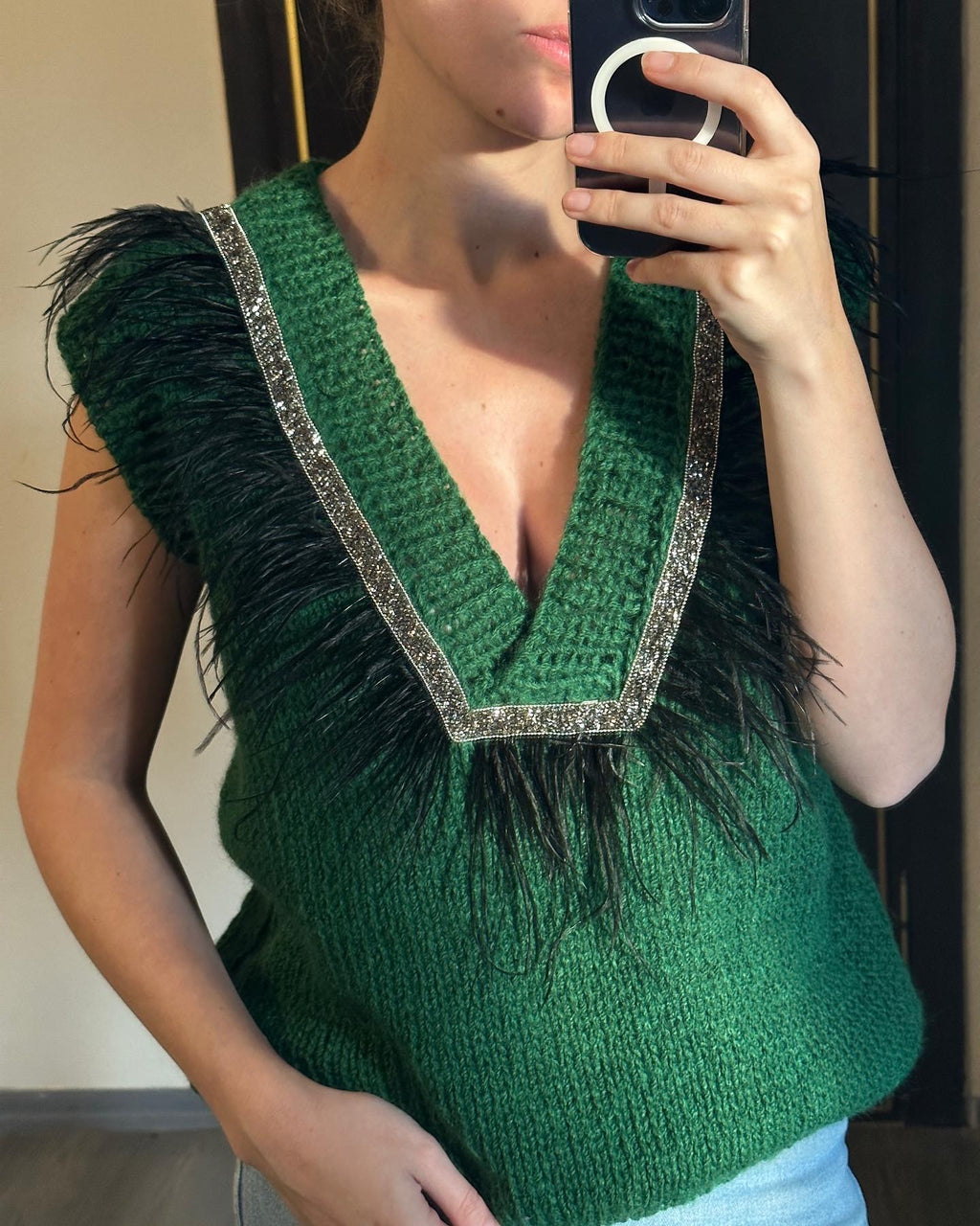 Brown vest with feathers