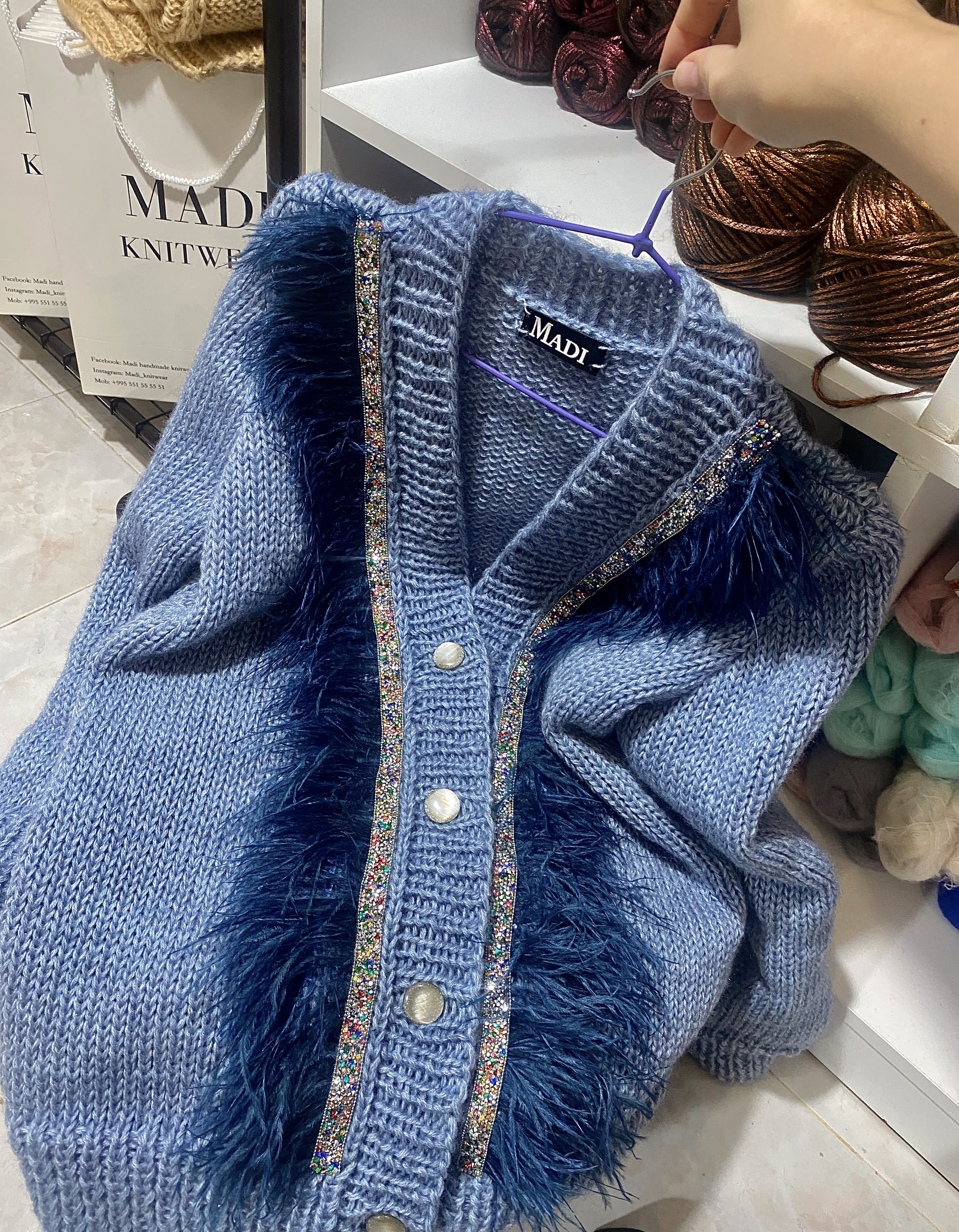 Blue jeans cardigan with feathers